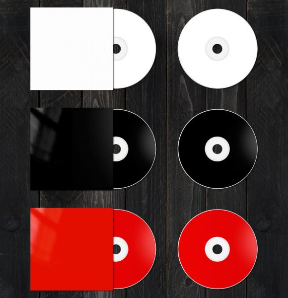 white-black-red-cd-dvd-covers-isolated-black-wood-surface (1)